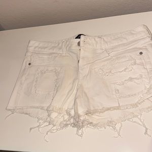 Expressed ripped Jean shorts. White - gently worn size 10